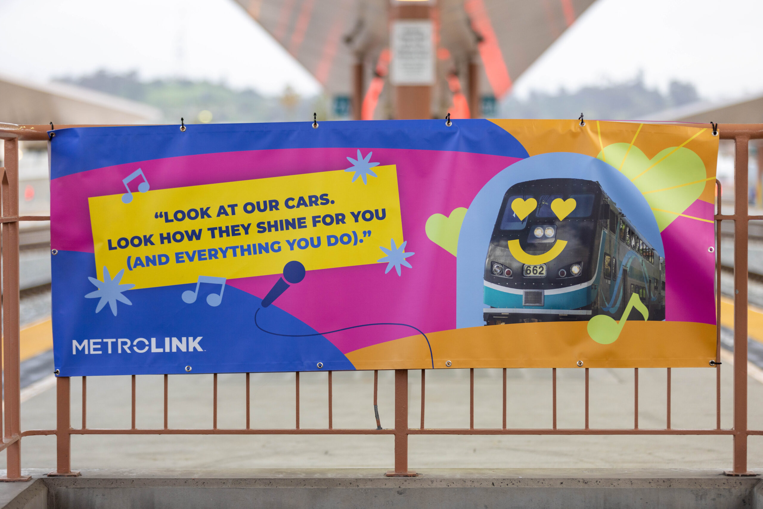 metrolink valentines day campaign banner hung on a rail