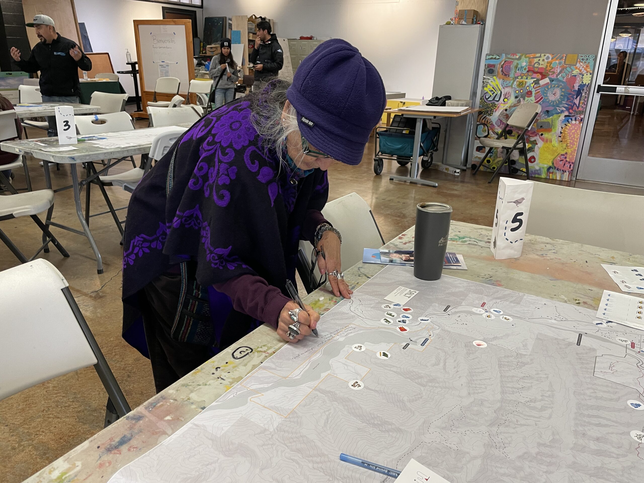 Seek the creek workshop participants mapping out different items on a map